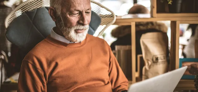 Senior businessmen working at his home